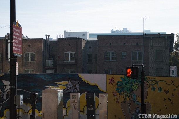 Temporary murals surround a vacant lot on K Street. Photo M.Hershenow. 2014.