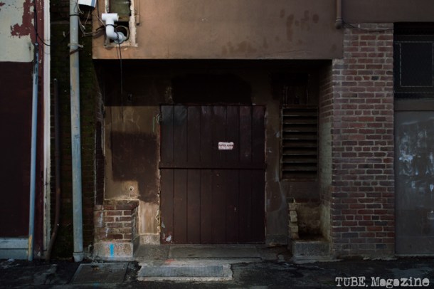 The backdoor of a building in Kayak Alley, between K and L Streets. Photo M.Hershenow. 2014.