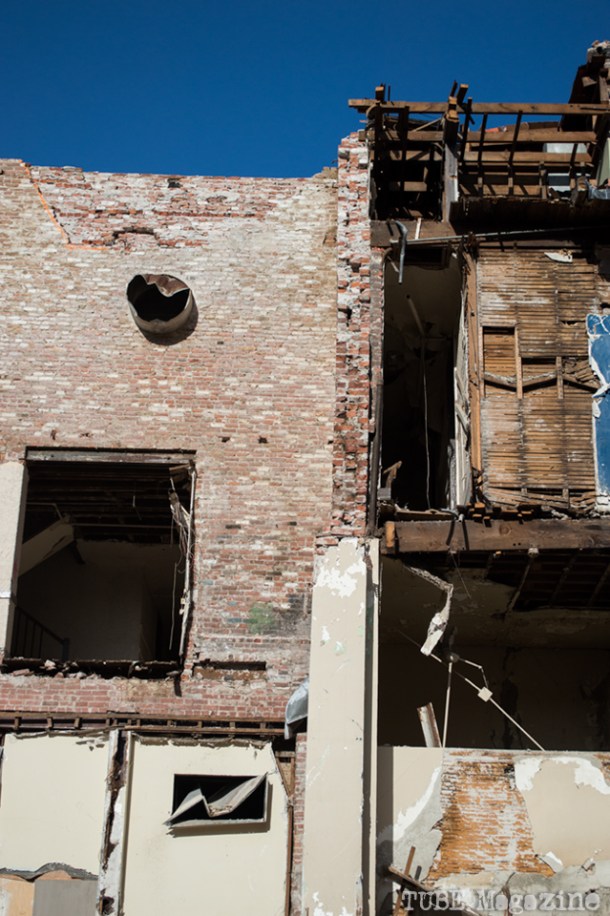The collapsed side of a partially demolished building along 7th Street. Photo M.Hershenow. 2014.
